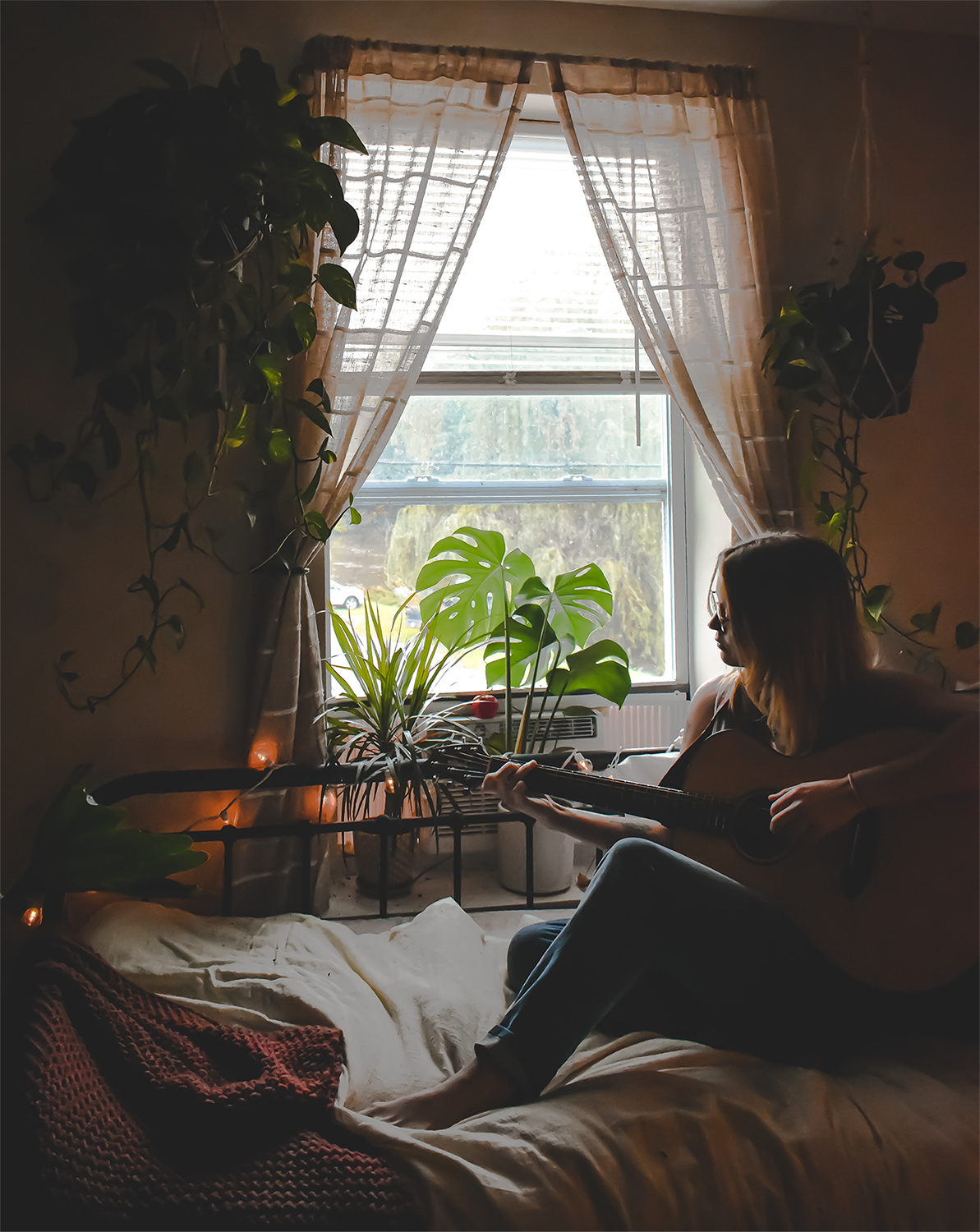 Lady Playing Guitar at Home
